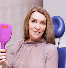 Пациентка Стоматологии Комфорта, прошедшая протезирование винирами фото пациентки, которой установили 16 виниров